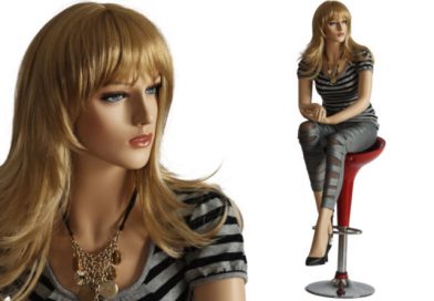 Sitting Female Mannequin - Model Liz shown sitting on red barstool wearing grey top with grey leather pants in blond wig along with close-up of her head and face